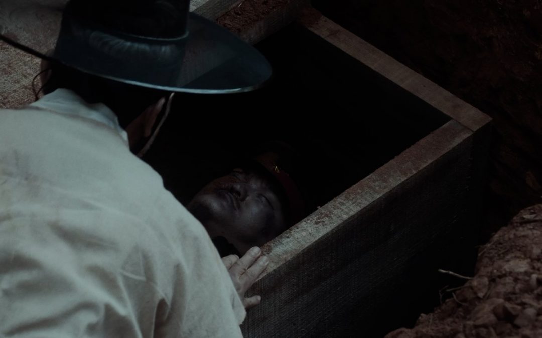 The old man and the grave